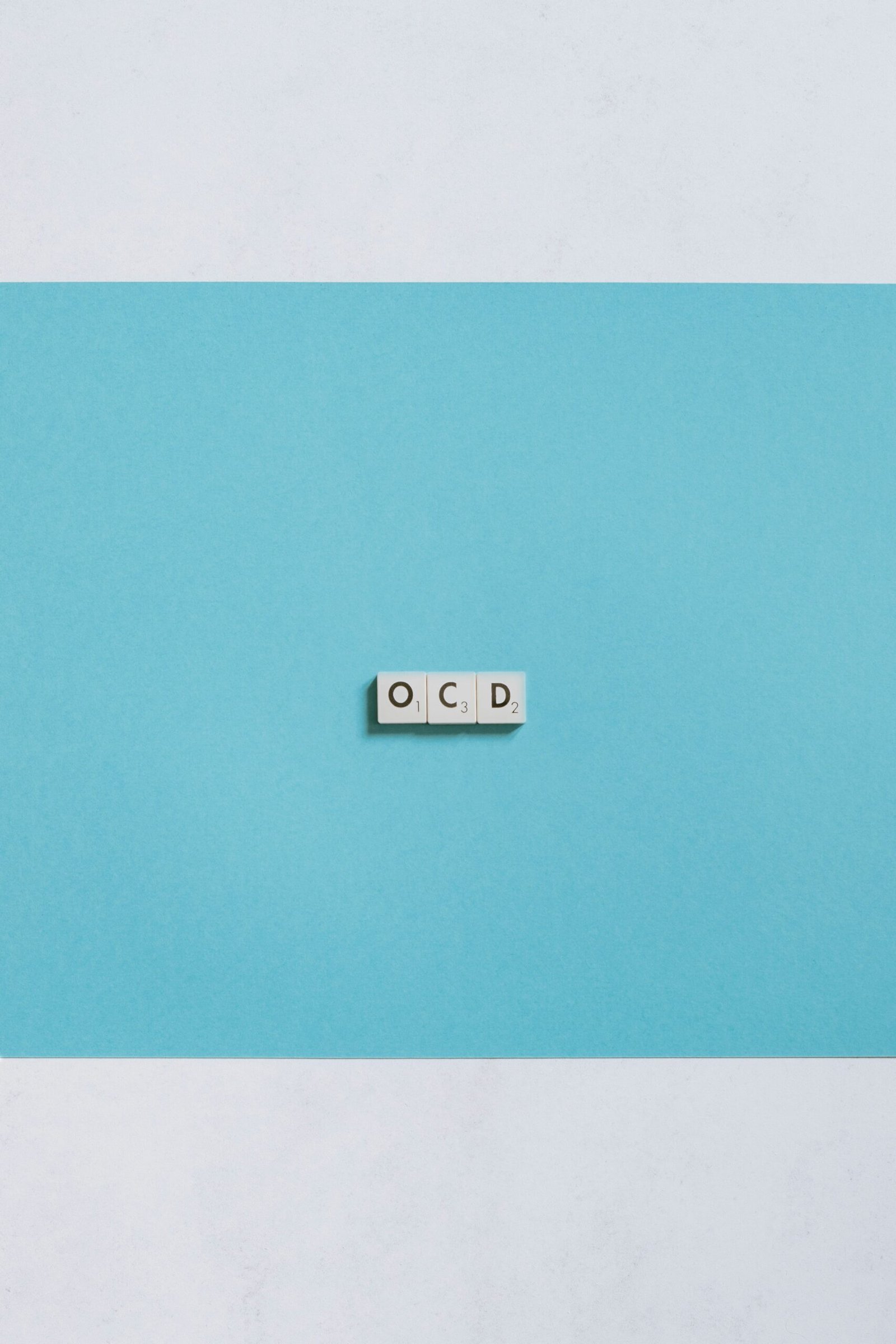 white wall mounted switch on blue wall